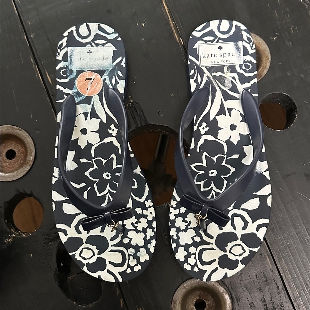 kate spade NEW YORK Navy and White Floral Flip Flops with Gold Charm